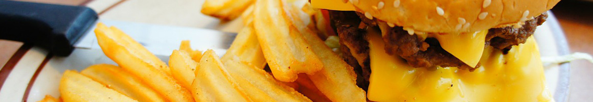 Eating Barbeque Burger at Big Burger Spot restaurant in Greensboro, NC.